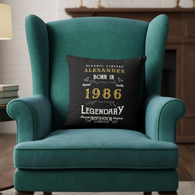 Almofada Personalized 40th Birthday Born 1986 Legend Black (Born 1986 throw pillow on a green chair.)