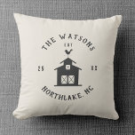 Almofada Personalized Farmhouse Barn Family Name<br><div class="desc">Bring cozy farmhouse charm to your sofa or entry bench with this personalized throw pillow featuring a simple barn illustration, weather vane, and your family name in rustic typography. Customizable text fields let you add your hometown and established year, creating a one-of-a-kind accent for your farmhouse, lake house, or country...</div>