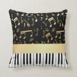 Almofada Preto e ouro das notas musicais e das chaves do<br><div class="desc">Um design elegante para o jogador do pianista ou de teclado - caracterizar chaves de teclado com ouro coloriu notas musicais em um fundo preto. A cor do fundo pode ser mudada a toda a cor para serir suas próprias necessidades e o estilo, tira colorida do ouro de A entre...</div>