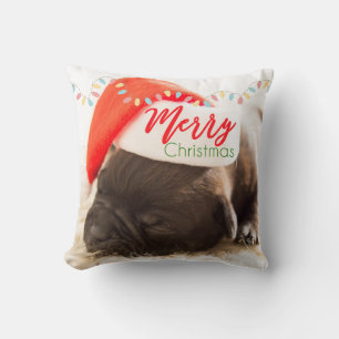 Almofada Pug do Natal no chapéu do papai noel com luzes de