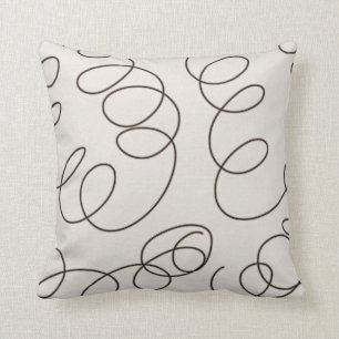 Almofada redemoinhos decorativos marrons macios do doodle