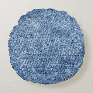 Almofada Redonda Lave com ácido o denim azul, textura próxima.