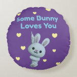 Almofada Redonda Some Bunny Loves You<br><div class="desc">Add a touch of love and charm to your home décor with the Some Bunny Loves You round pillow! 🐰💜💛 Featuring a cheerful bunny surrounded by sweet yellow hearts and playful text, this design is perfect for spreading warmth and Easter joy. Ideal for couches, chairs, nurseries, or seasonal displays, it...</div>