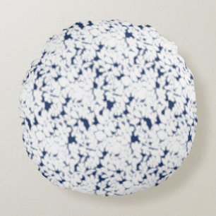 Almofada Redonda um fundo branco e azul com um padrão