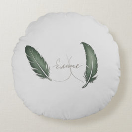 Almofada Redonda Um travesseiro redondo com design minimalista.