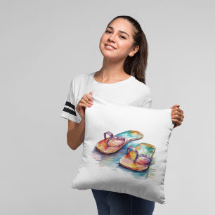 Almofada sacudir coloridos flutuam numa praia em aquarela