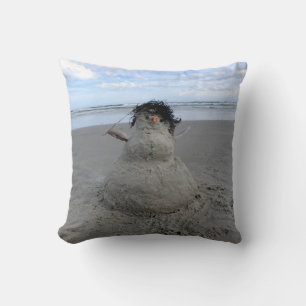 Almofada Sandman de inverno na praia