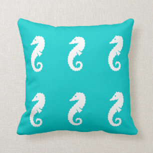 Almofada SEAHORSE BRANCO em travesseiro azul