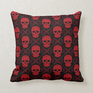Almofada Teste padrão vermelho e preto do crânio do açú