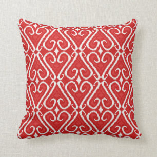 Almofada Teste padrão vibrante do ikat no vermelho e no