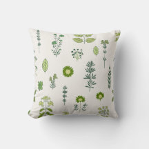 Travesseiro decorativo de tons verdes e toques da