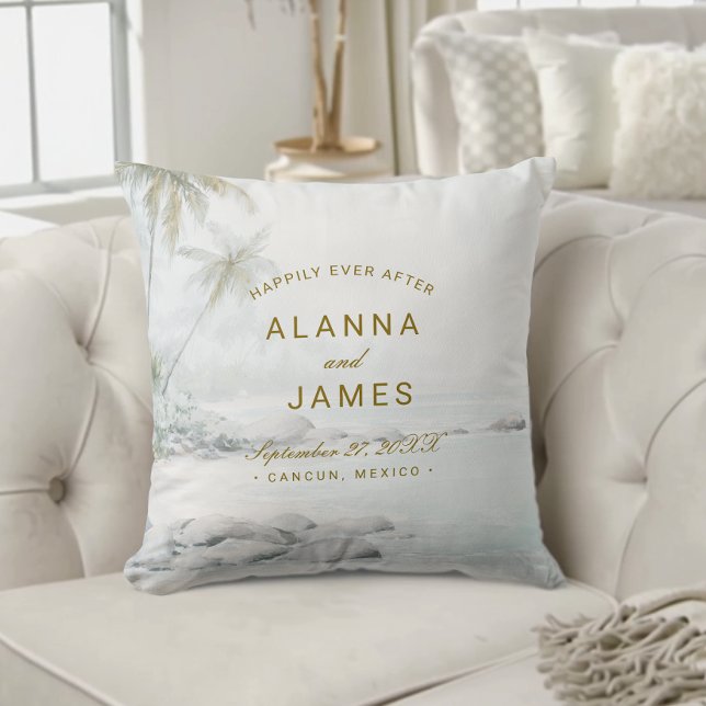 Almofada Tropical Watercolor Beach Wedding Photo Pillow (Beach-themed wedding pillow with “Alanna and James” and date text on a cream tufted sofa.)