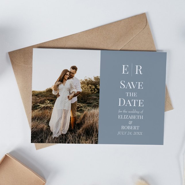 Anúncio de Data de Casamento com Foto Personalizad (Dusty Blue Monogram Custom Photo Save the Date Invitation on a white table with neutral decoration)