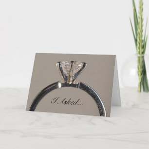 Anúncio Diamond Ring on Gray Engagement Announcement