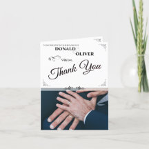 Mãos de um Casal de Casamento Gay com Anéis