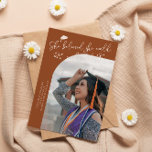 Anúncio She Believed Terracotta Graduate Curved Photo<br><div class="desc">Modern and whimsical graduation announcement photo card featuring a curved photo on the front and 1 on the back. The text says "She believed she could,  so she did" with hand drawn stars and a graduation cap. Add the graduate's name,  information,  and message to personalize this card. Terracotta background.</div>