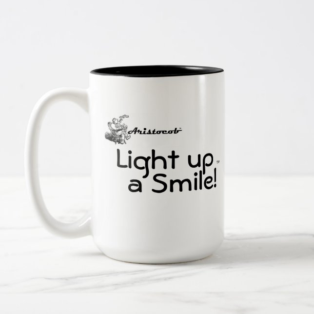 Aristocob: Ilumine acima um sorriso! Caneca (Esquerda)