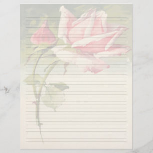 Artigos de papelaria alinhados florais do