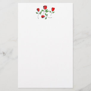 Artigos de papelaria com encabeçamento dos rosas