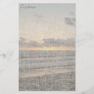 Artigos de papelaria de linho do por do sol da