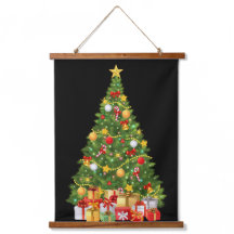 Árvore de Natal do ouro e apresenta fita de parede