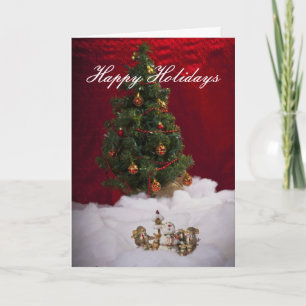 Árvore de Natal e cartão do feriado de Caroller do