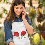 Avental Adulto com pino de Tênis mesa<br><div class="desc">Dois morcegos de pingue-pongue de mesa e uma bola. Esta design parece realmente eficaz nestes Apron</div>