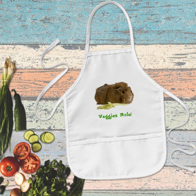 Avental Infantil Pinus Adorável Comendo Fotografia Aipo (Cute guinea pig kids apron as a fun gift idea is available in three fabric colors. )