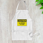 Avental Sinal de Piso do Slipper de Cuidado<br><div class="desc">Um sinal de chão escorregadio em amarelo. Esta design parece realmente eficaz nestes Apron</div>