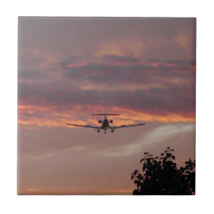 Azulejo De Cerâmica Aterragem comercial do jato no por do sol