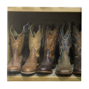 Azulejo De Cerâmica Botas de vaqueiro ocidentais na prateleira