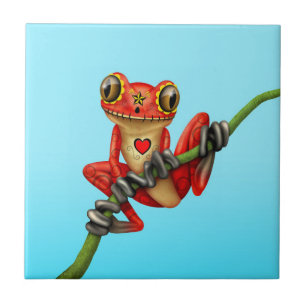 Azulejo De Cerâmica Dia vermelho do sapo de árvore inoperante do