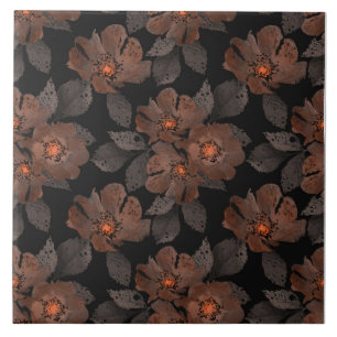 Azulejo De Cerâmica Flores laranja e marrom em um fundo preto.