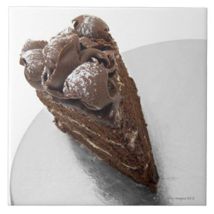Azulejo De Cerâmica Ideia elevado de uma parte de bolo de chocolate