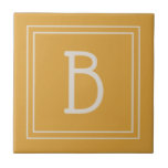 Azulejo De Cerâmica Inicial Amarela Dourada e Branca Monograma Chic<br><div class="desc">Monograma personalizado moderno e elegante adicionado ao azulejo decorativo de estilo simples chic em amarelo dourado e branco. Ótima ideia de presente! Personalize facilmente com a ferramenta de design para torná-lo seu! Entre em contato comigo em beachpausedesigns@gmail.com se precisar de ajuda ou tiver dúvidas sobre este ou qualquer outro design....</div>