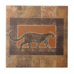 Azulejo De Cerâmica Leopardo no fundo laranja e castanho<br><div class="desc">Norman Wyatt tem uma coleção incrível de arte capturando a beleza dos animais. O fundo é o tema africano, com laranjas nítidas e castanhos e o desenho de um leopardo sobre ele se mistura perfeitamente com ele. Aproveite o melhor da natureza com esta imagem hoje.</div>