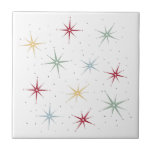 Azulejo De Cerâmica Meio século Funky Atomic Starbursts 1950<br><div class="desc">Engraçado o seu projeto de martelagem com este fabuloso azulejo de cerâmica estelar da era atômica. Este design apresenta rajadas de estrelas em vermelho,  azul,  verde e amarelo e acentuadas com pontos pretos.</div>