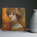 Azulejo De Cerâmica Ouro Fase Gustav Klimt Mosaic Edwardian Mulher C<br><div class="desc">Este belo azulejo cerâmico apresenta um trabalho de arte inspirado na "fase de ouro" de Gustav Klimt, representando uma mulher da era Edwardian. Nesse período, Klimt ficou fascinado pelos mosaicos bizantinos e desenvolveu sua técnica de mosaico com folha de ouro e cores vibrantes. Este trabalho de arte homenageia a abordagem...</div>
