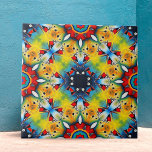Azulejo De Cerâmica Padrão Geométrico de Intrato Vibrante Caleidoscópi<br><div class="desc">Esse azulejo cerâmico apresenta um design vibrante e intrincado. No coração do azulejo está um padrão em forma de estrela, renderizado em tons negros de azul. Este motivo central é rodeado por formas radiantes num tom amarelo impressionante, enfeitado com delicados sotaques em vermelho e verde. O design é caracterizado por...</div>