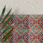 Azulejo De Cerâmica Padrão Geométrico Vibrante em Circunstância Étnica<br><div class="desc">Esse azulejo cerâmico apresenta um padrão simétrico cativante que combina influências tradicionais e étnicas. As formas geométricas, incluindo os diamantes e as linhas ziguezagueadas, criam um ritmo visual dinâmico que é tanto engajador quanto harmonioso. A paleta de cores é rica e úmida, com cor verde, laranja queimada, vermelho profundo e...</div>