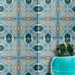 Azulejo De Cerâmica Padrões Geométricos de Azul Suave e Indigo de Calm<br><div class="desc">Esse azulejo cerâmico apresenta um padrão caleidoscópico complexo. O design é simétrico, com formas abstrato que lembram flores e figuras geométricas. O azulejo é enfeitado com uma paleta calafável de vários tons de azul, lacre, creme e branco, que se misturam harmoniosamente para criar um efeito visualmente agradável. A parte central...</div>