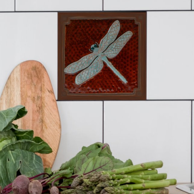 Azulejo De Cerâmica Relator de parecer Azulejo, Castanho e turquesa (Brown and turquoise dragonfly tile shown in a kitchen with  white tiles.)