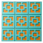 Azulejo de cerâmica Retro Turquoise e Orange Trell<br><div class="desc">Adicione um esplash de médio moderno de Palm em qualquer lugar que você vá com este azulejo retro turquesa e padrão laranja de trellis. Foi inspirado por blocos de brisa de concreto antigos. A tomada desconstruída da arquitetura dos anos 50 dará uma sensação instantânea de designer à vida cotidiana.</div>