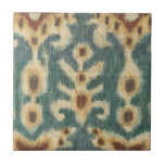 Azulejo De Cerâmica Tecido de Design Ikat decorativa por Chariklia Zar<br><div class="desc">Um padrão abstrato feito por Chariklia Zarris,  ele apresenta um design conhecido como ikat. Essa forma particular de tecelagem utiliza a resistência ao tingimento,  o que impede que o corante penetre em todo o tecido. Isso cria padrões interessantes em um tecido que parece incrível em sua parede!</div>