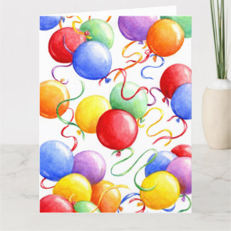 Balões coloridos com cartão de aniversário