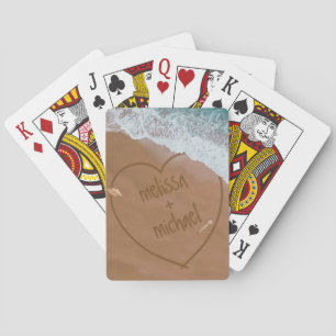 Baralho Casais de Escrevendo de areia bonito na praia