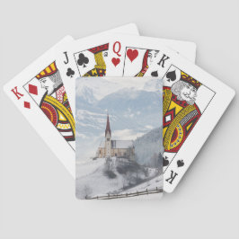 Baralho Igreja em uma paisagem alpina do inverno