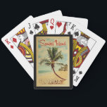 Baralho Viagens vintage da Árvore Palm da Ilha Sanibel<br><div class="desc">Um impressão de arte da Flórida do século médio único,  no estilo de poster viagens vintage,  moderno da ilha Sanibel da Flórida. Ele apresenta uma palmeira curva na praia arenosa com oceano sob um céu azul nublado.</div>