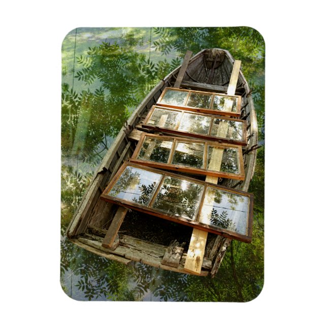 Barco de madeira numa cama de íman de folhas de ma (Vertical)