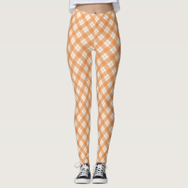 Beige and white checkered leggings displayed 